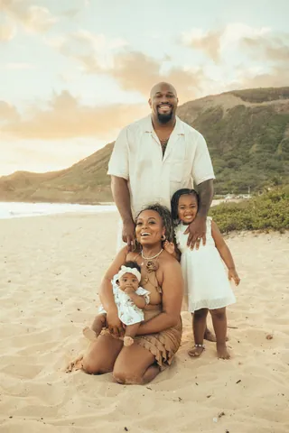 Family with a baby on the beach in Hawaii