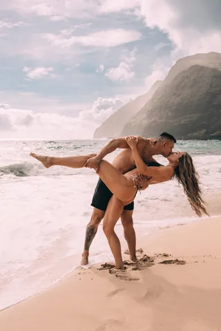 Couple dancing on the beach in Hawaii